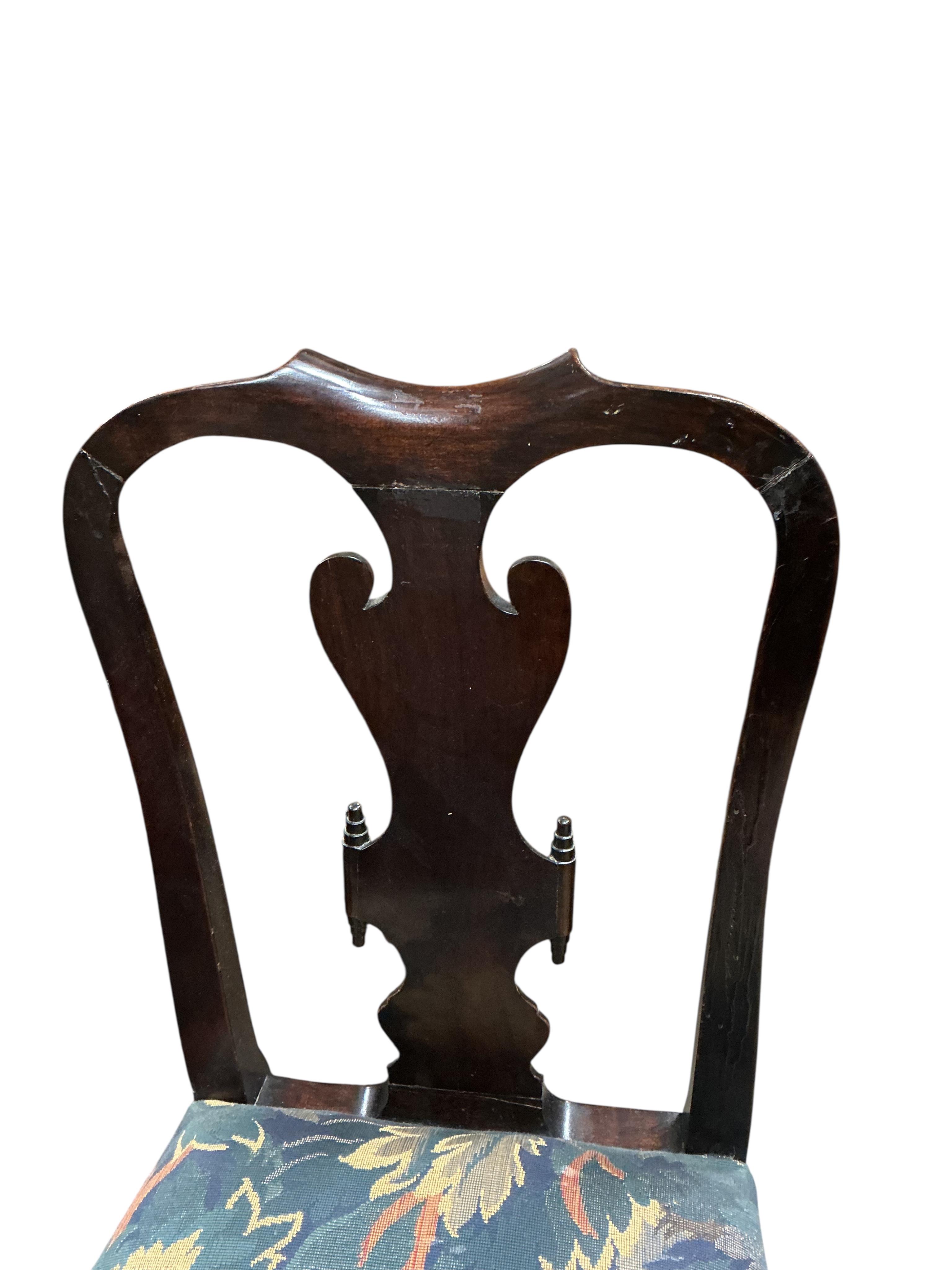 A set of six Queen Anne style mahogany dining chairs